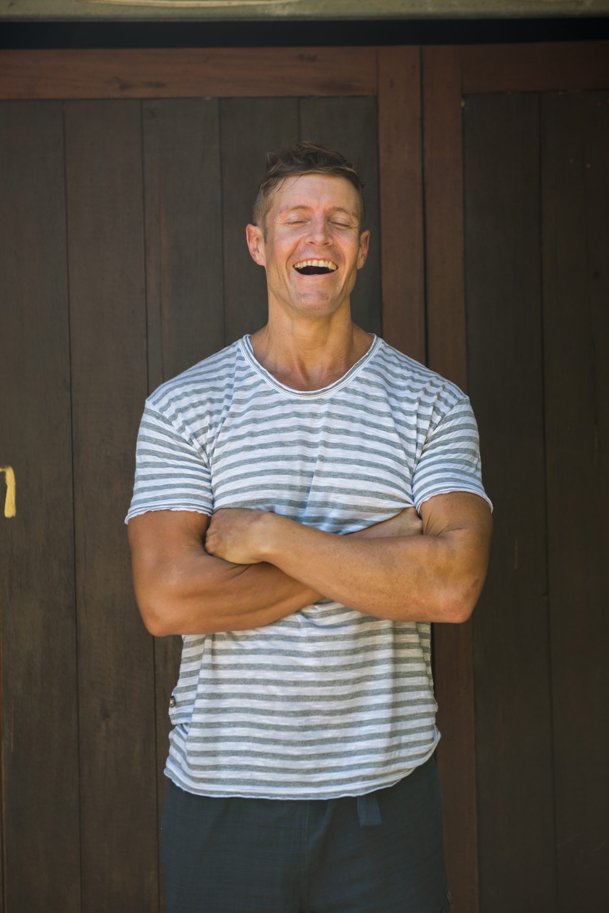 Dai Manuel laughing in a studio portrait