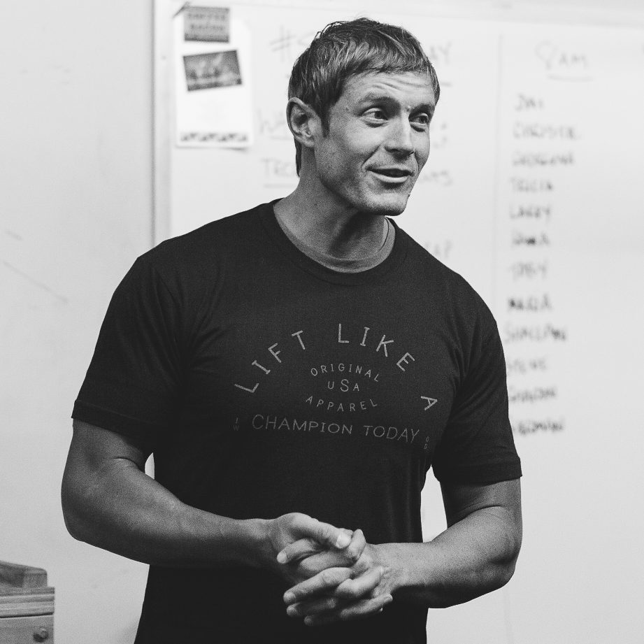 Dai Manuel speaking candidly in front of a marked-up coaching whiteboard